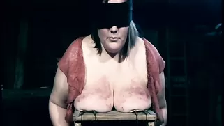 BBW With In Black Blindfold Gets Her Tits Nailed In Dungeon